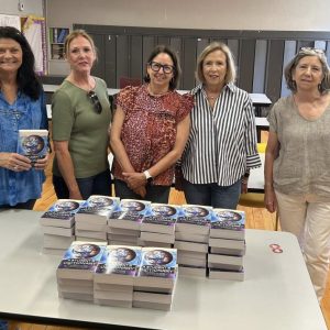 donated dictionaries and teachers